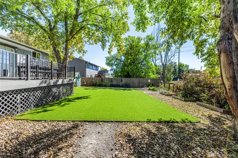 a view of a backyard with a garden