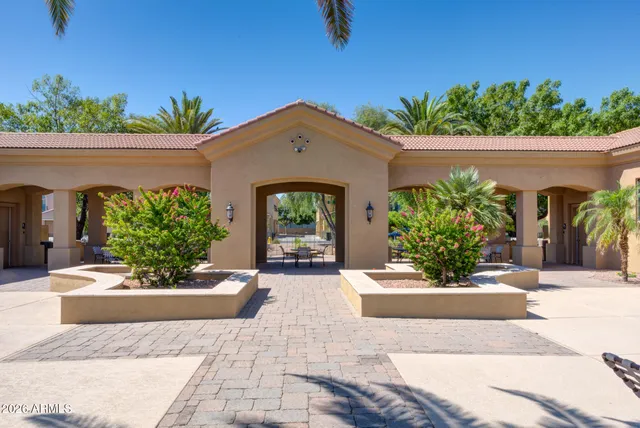 a kitchen with stainless steel appliances granite countertop a stove and a refrigerator