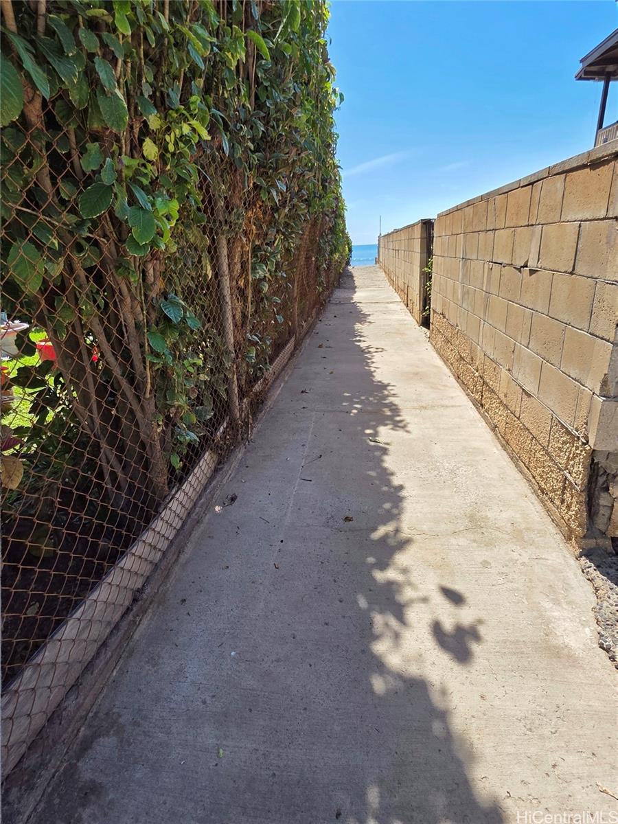 91-669 Pohakupuna Road Ewa Beach, HI 96706 - Photo 11 of 15 a view of a pathway with a yard
