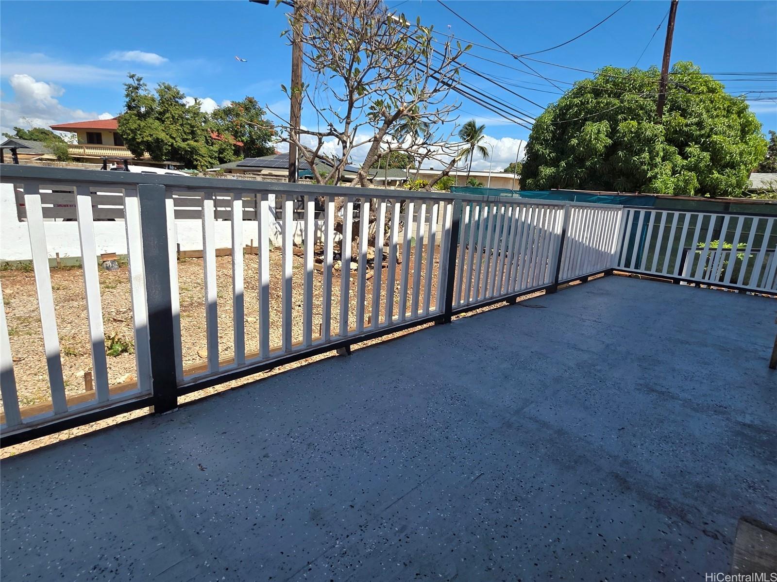 91-669 Pohakupuna Road Ewa Beach, HI 96706 - Photo 2 of 15 a view of a porch with wooden fence