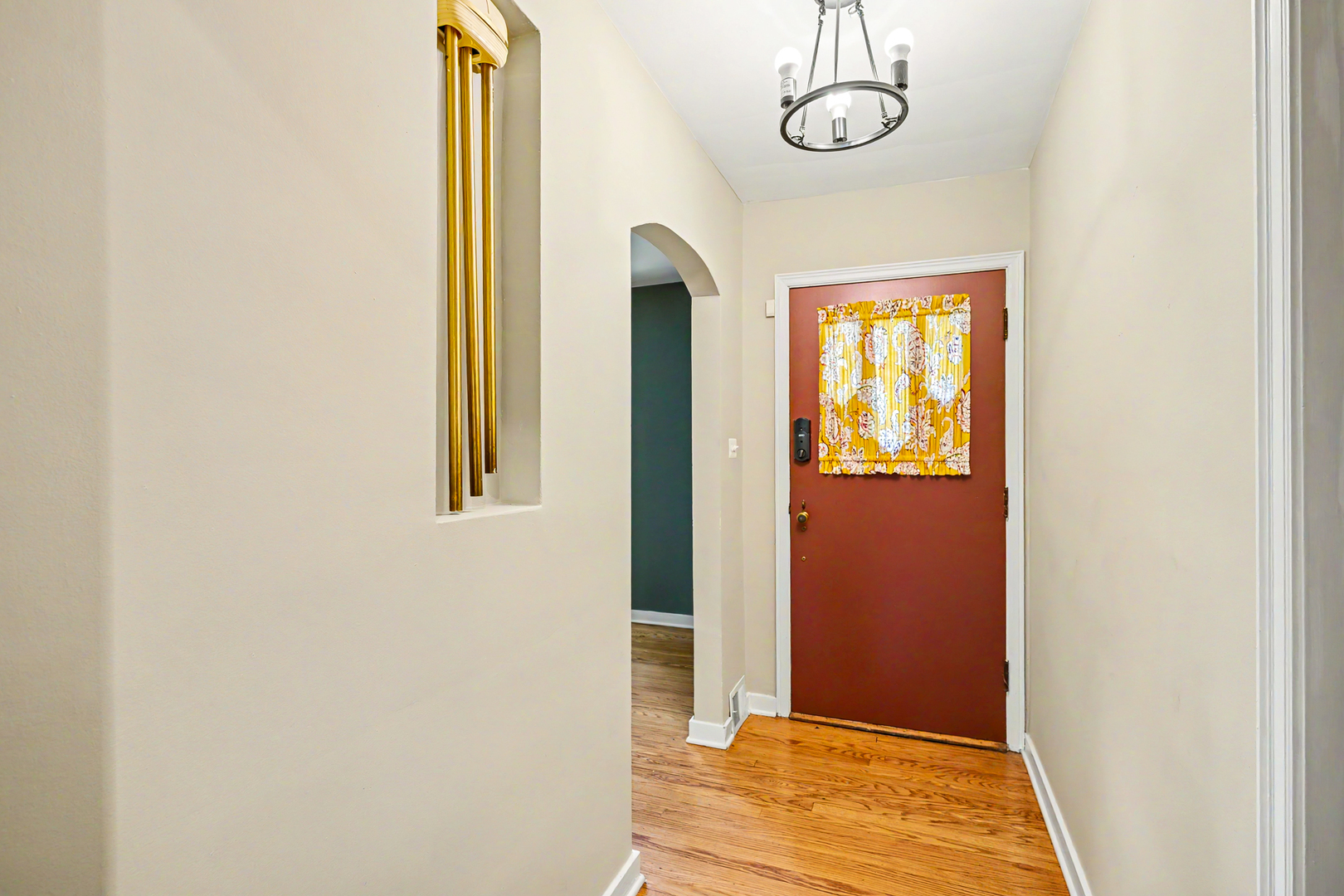 325 South Lambert Road Glen Ellyn, IL 60137 - Photo 8 of 32 a view of a room with wooden floor and white walls