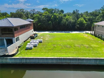 a view of swimming pool with a yard