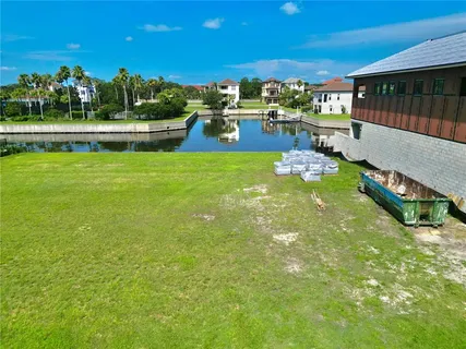 a view of yard with swimming pool and outdoor seating
