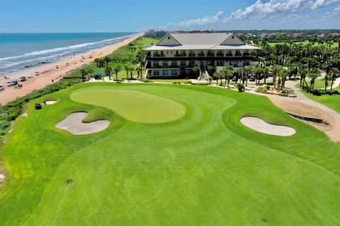 a view of a house with a big yard