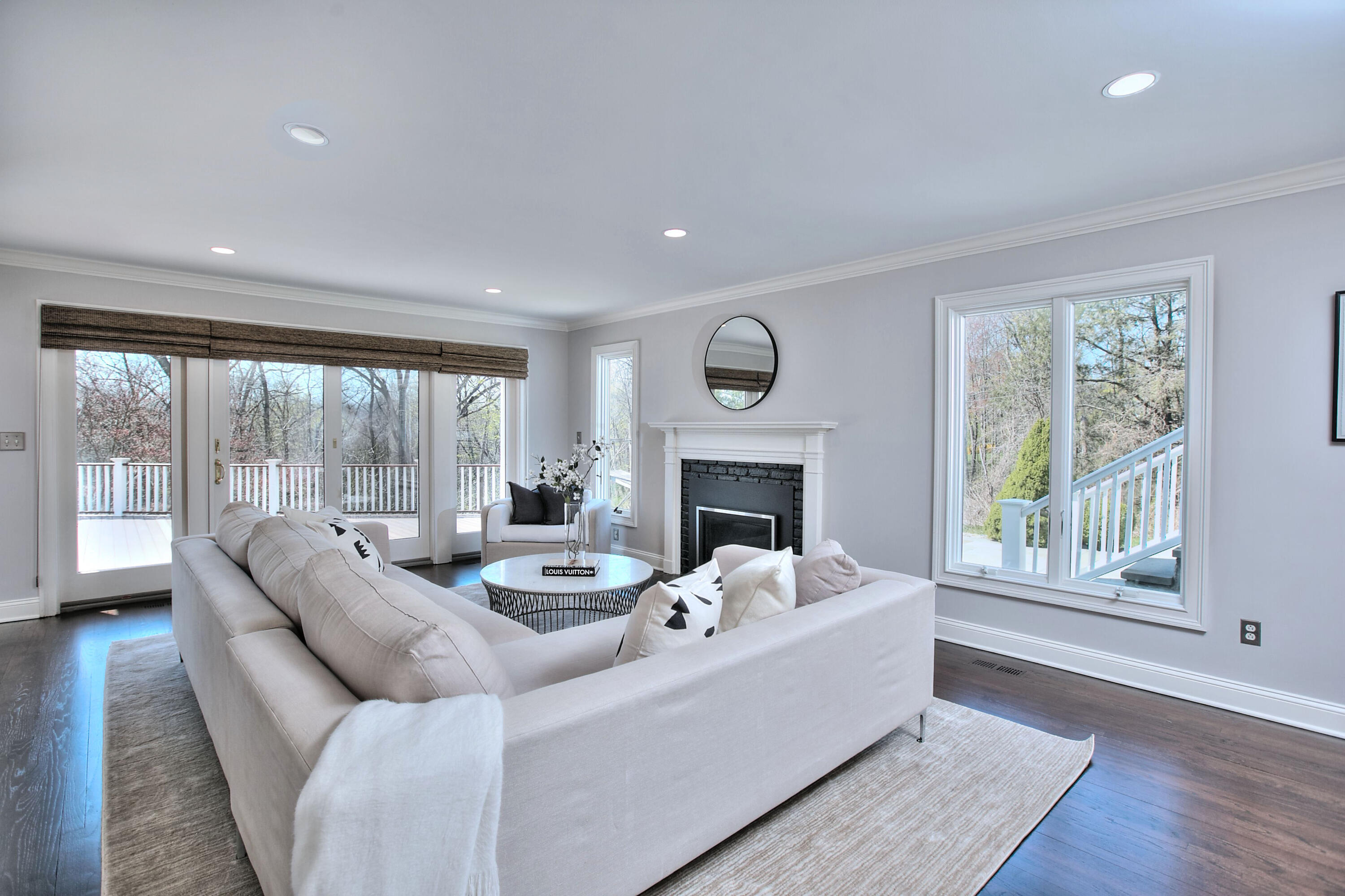 970 Ponus Ridge Road New Canaan, CT 06840 - Photo 11 of 39 a living room with furniture and a fireplace