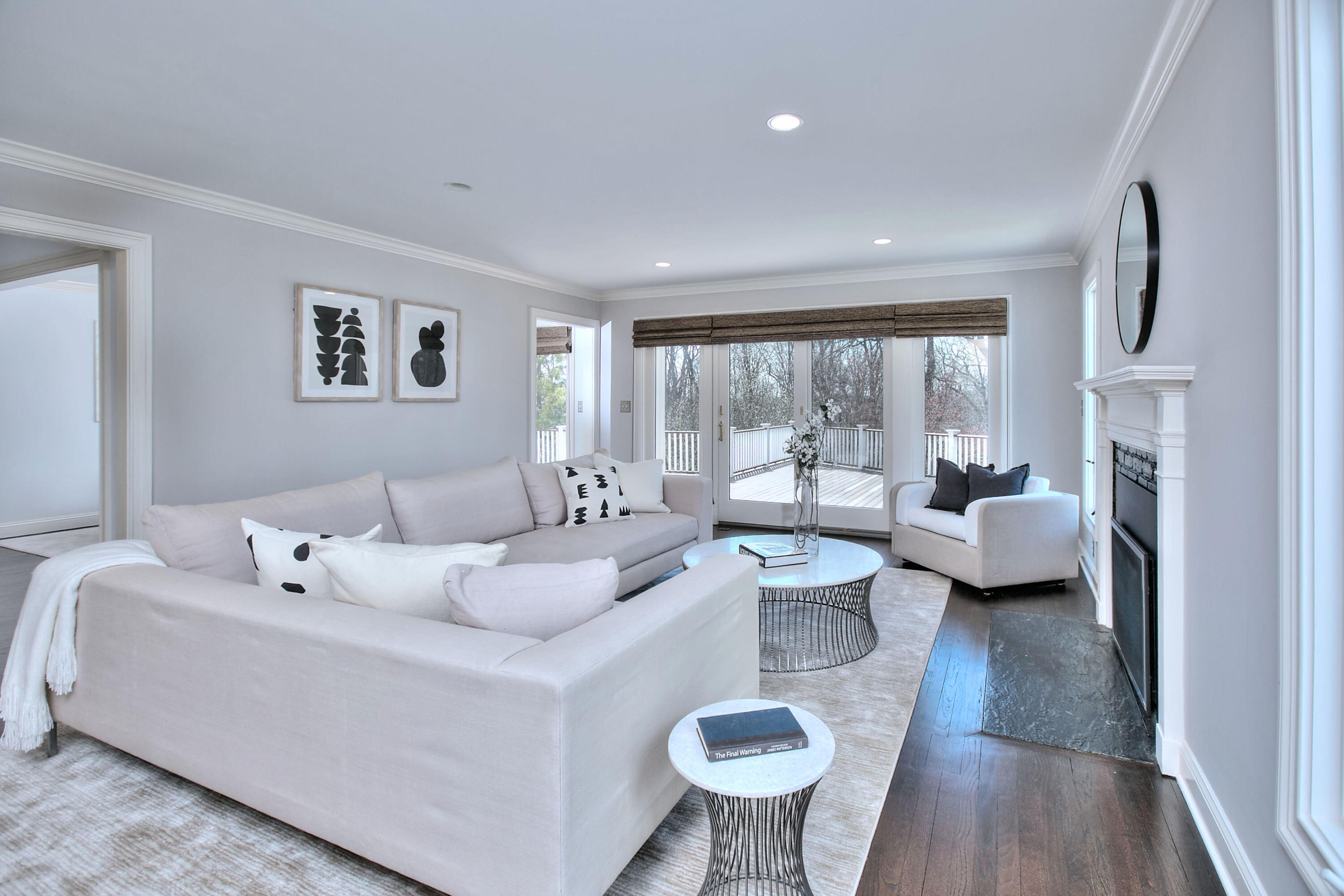 970 Ponus Ridge Road New Canaan, CT 06840 - Photo 12 of 39 a living room with furniture and a large window