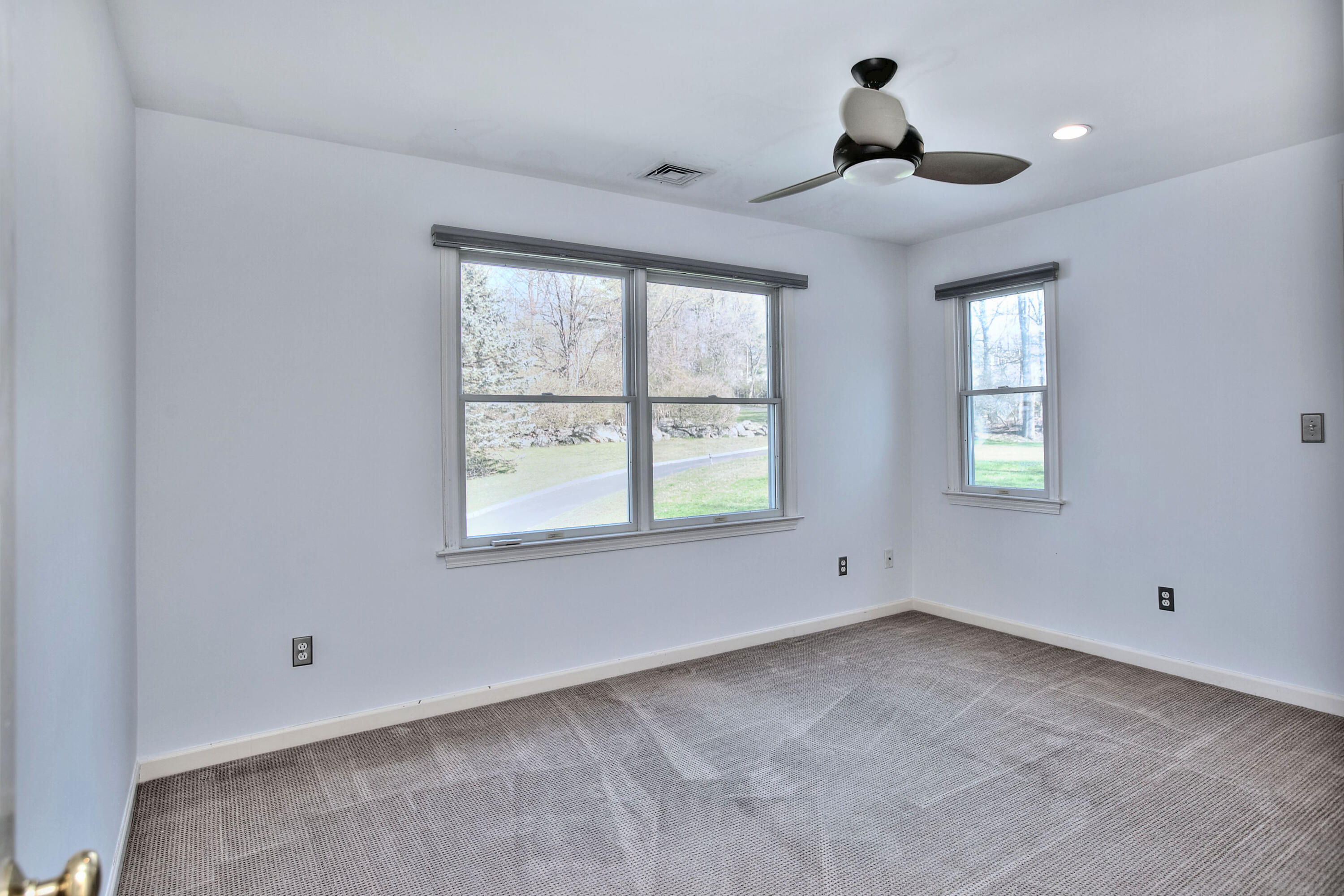 970 Ponus Ridge Road New Canaan, CT 06840 - Photo 21 of 39 a view of an empty room with a window
