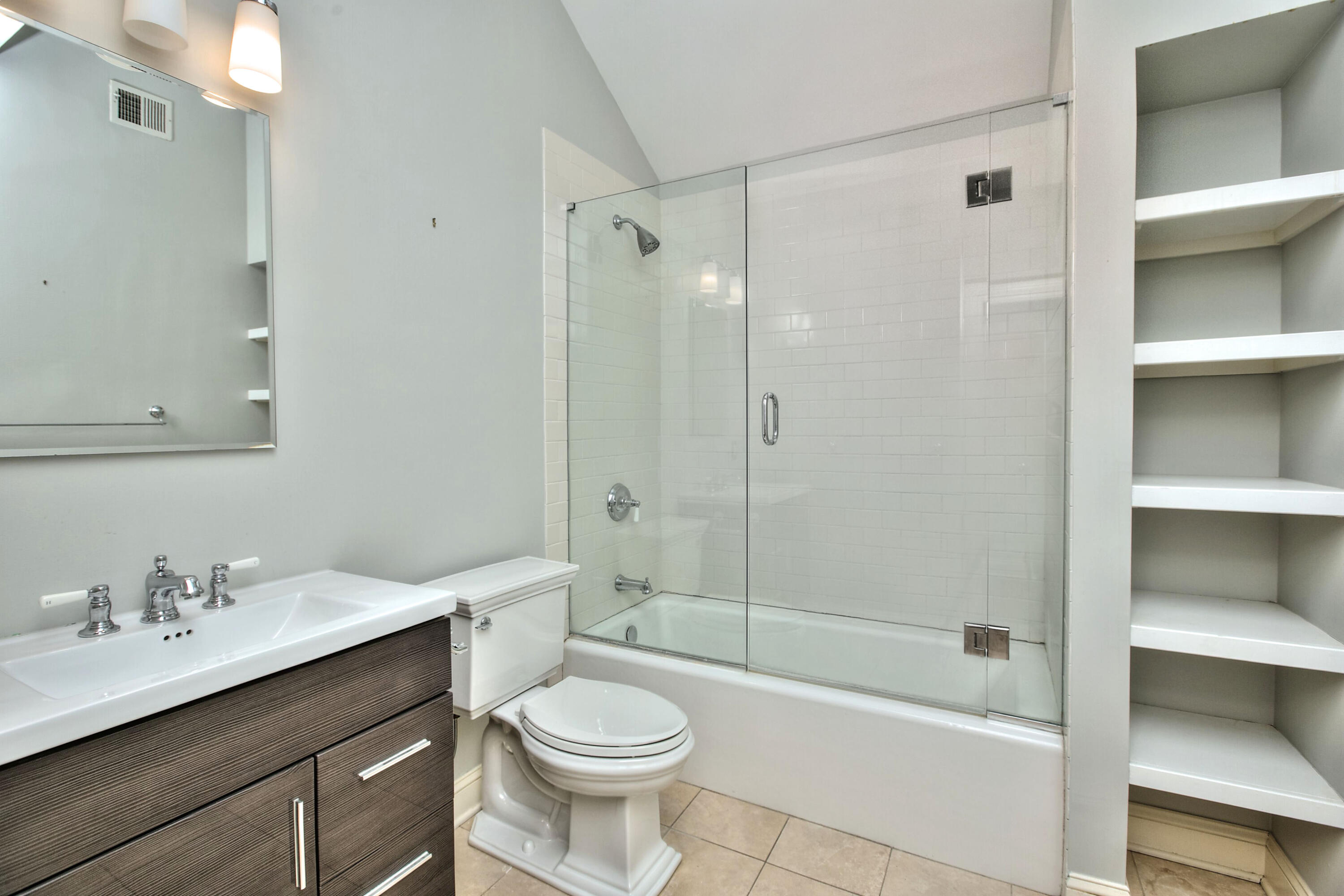 970 Ponus Ridge Road New Canaan, CT 06840 - Photo 22 of 39 a bathroom with a sink a toilet and shower