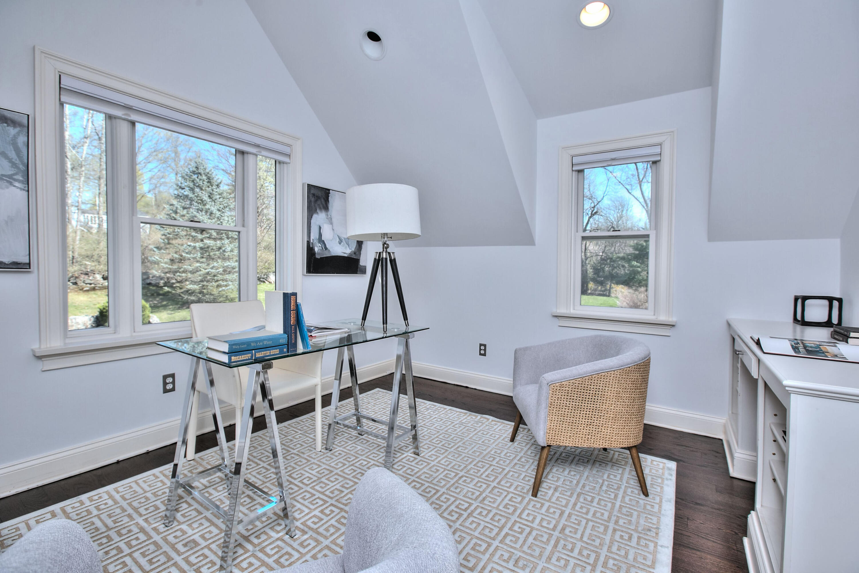 970 Ponus Ridge Road New Canaan, CT 06840 - Photo 24 of 39 a workspace with wooden floor and a window
