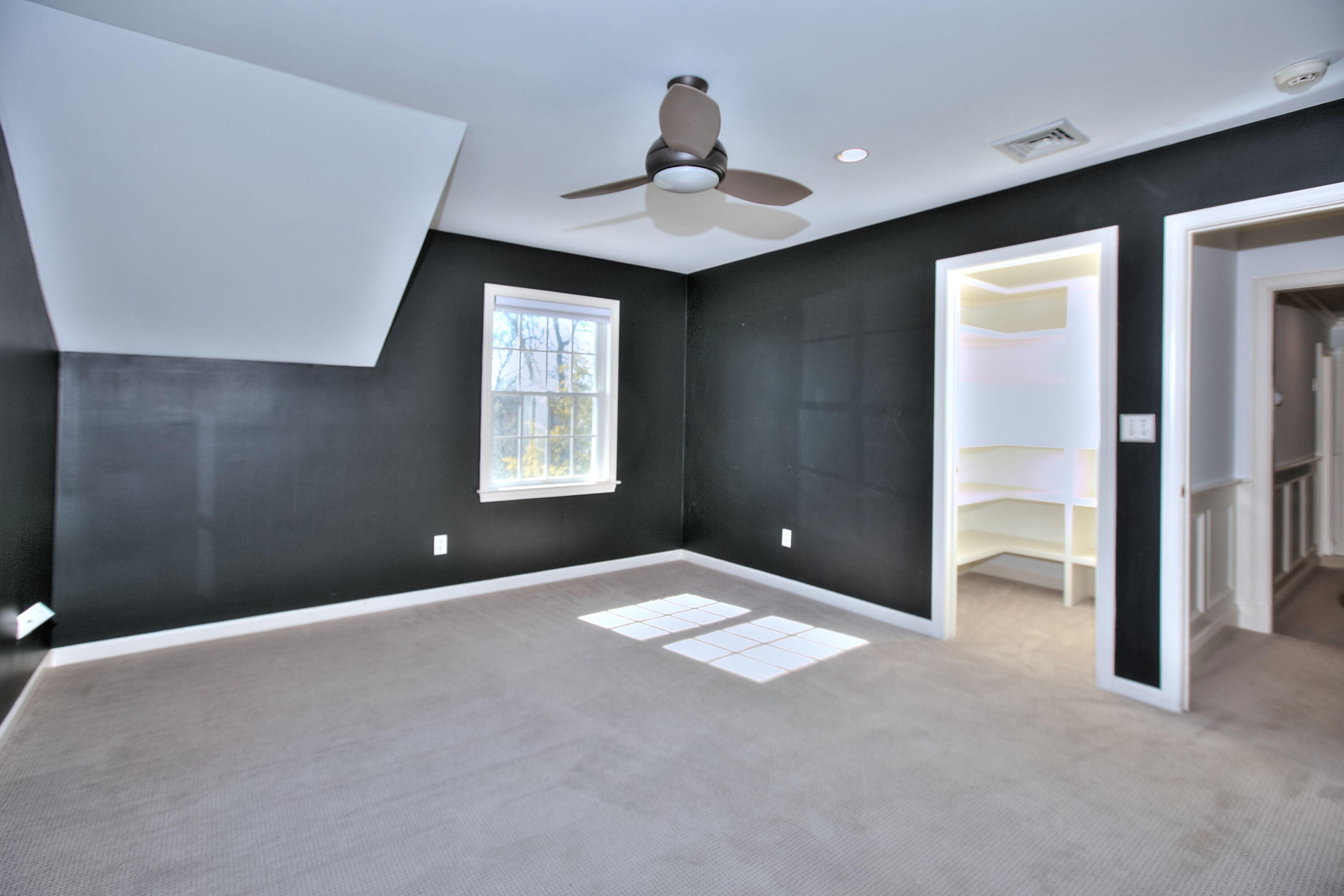 970 Ponus Ridge Road New Canaan, CT 06840 - Photo 25 of 39 a view of an empty room with a window