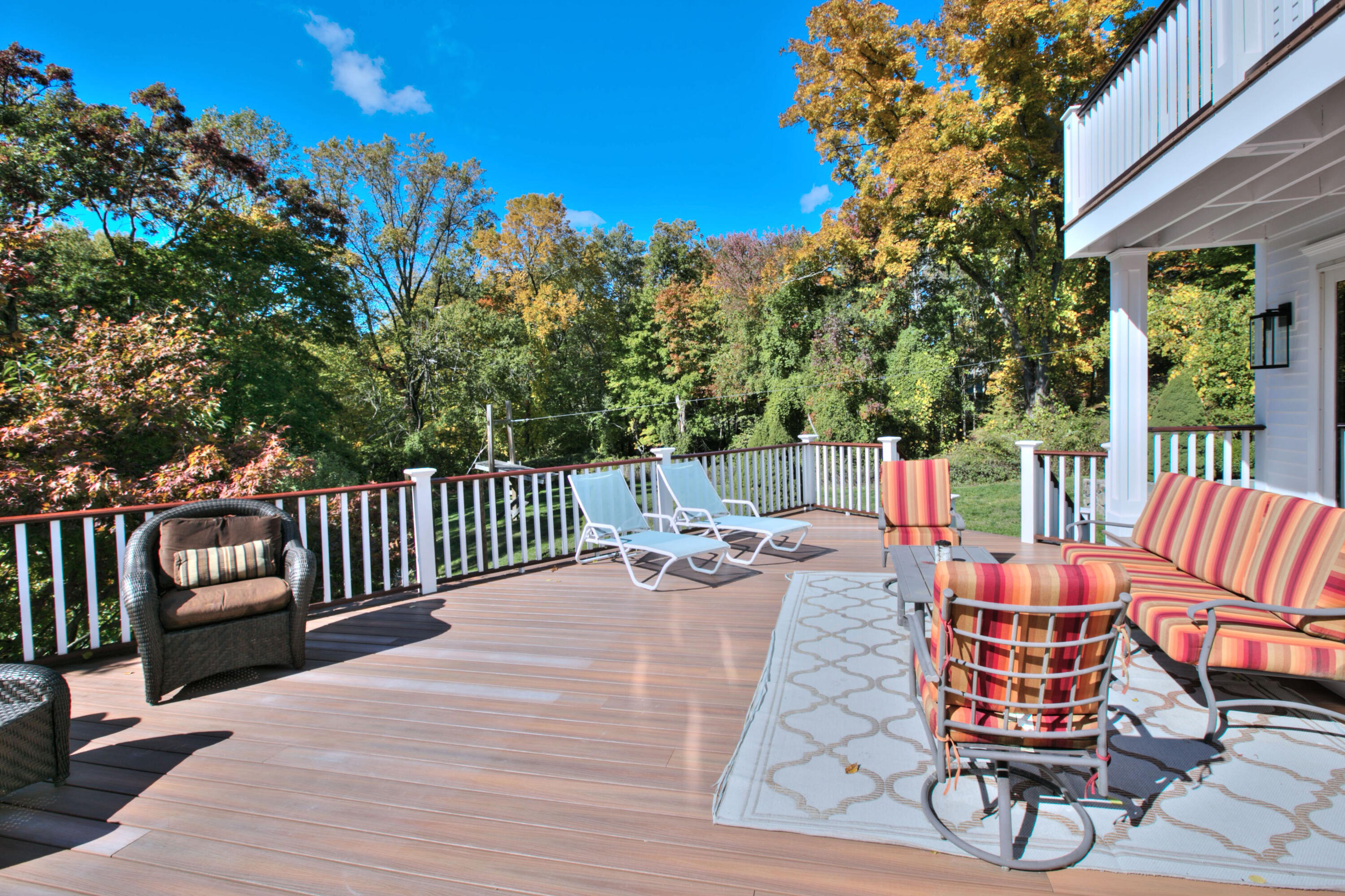 970 Ponus Ridge Road New Canaan, CT 06840 - Photo 29 of 39 a view of a chairs and tables in the patio