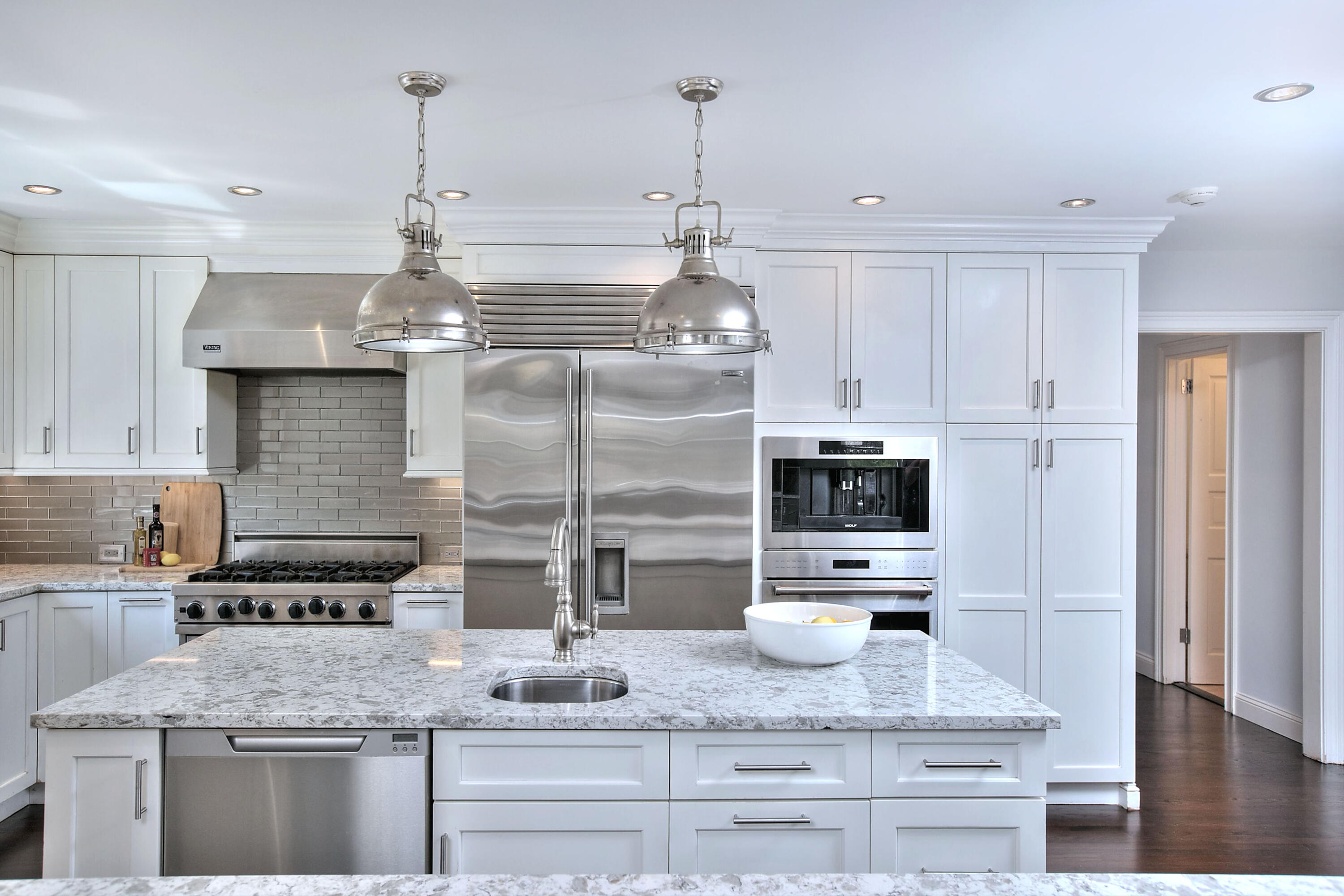 970 Ponus Ridge Road New Canaan, CT 06840 - Photo 7 of 39 a kitchen with stainless steel appliances granite countertop a sink refrigerator and cabinets