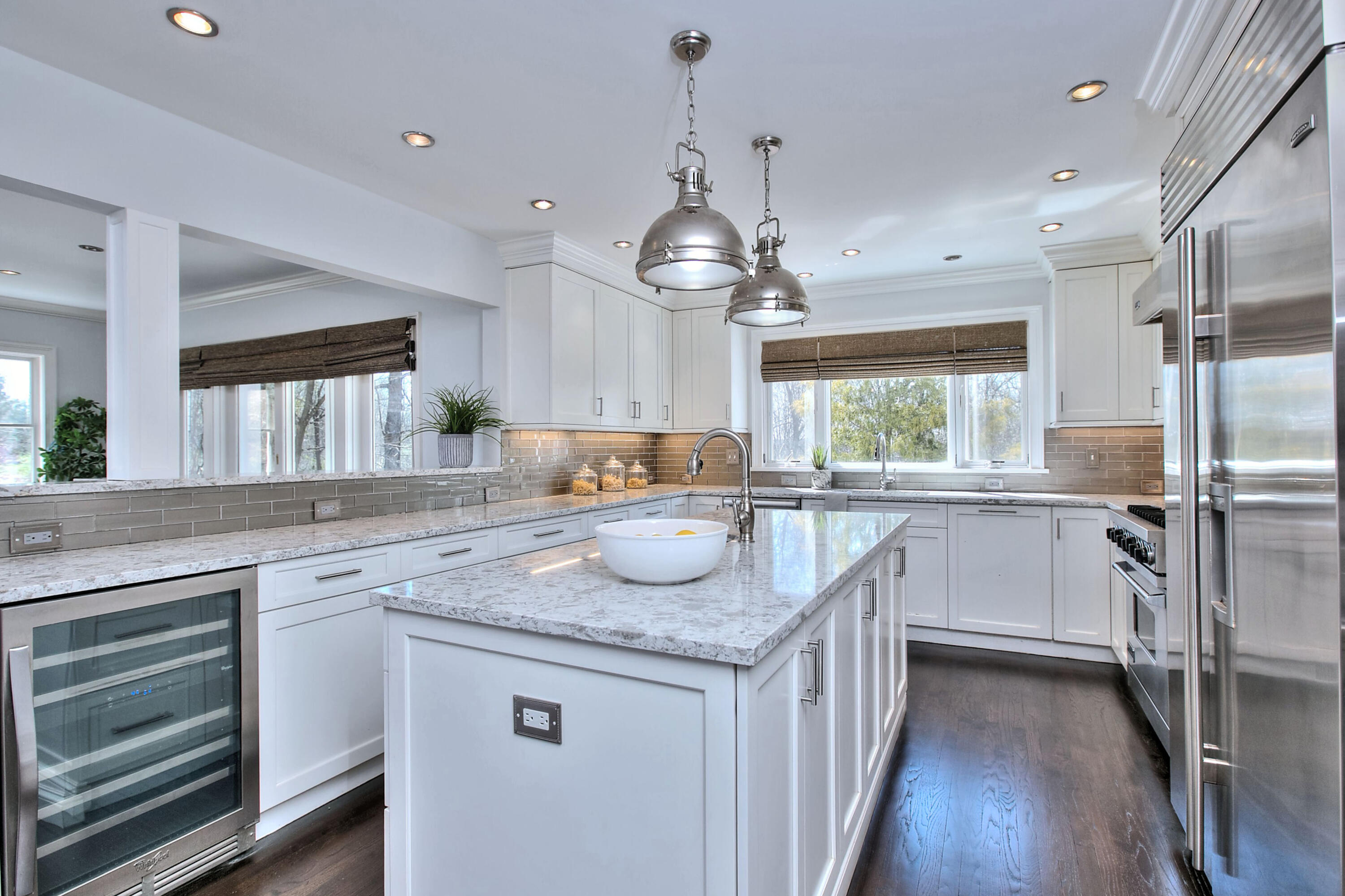 970 Ponus Ridge Road New Canaan, CT 06840 - Photo 8 of 39 a kitchen with a sink stove and refrigerator