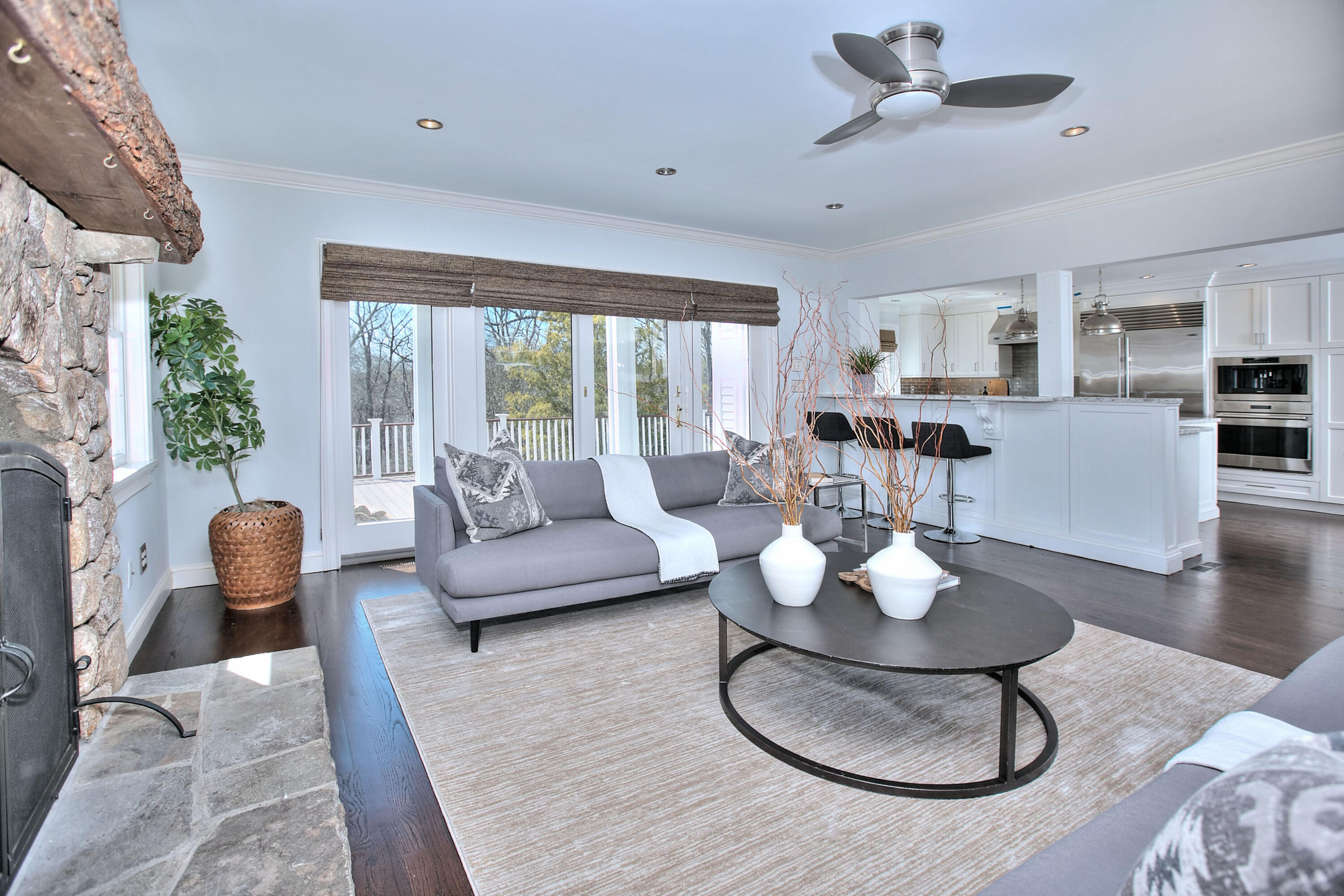 970 Ponus Ridge Road New Canaan, CT 06840 - Photo 10 of 39 a living room with furniture couches and a large window