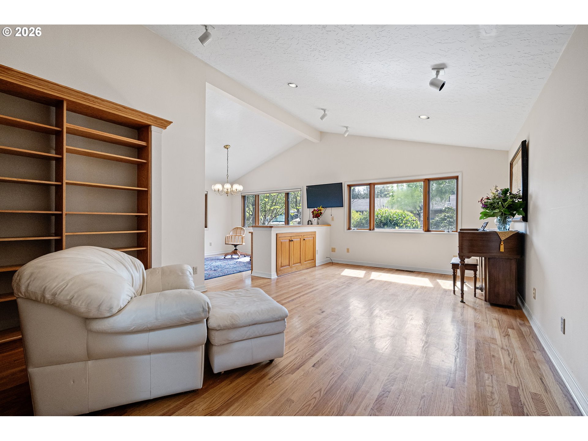 84 Green Lane Eugene, OR 97404 - Photo 11 of 41 a living room with furniture and a wooden floor