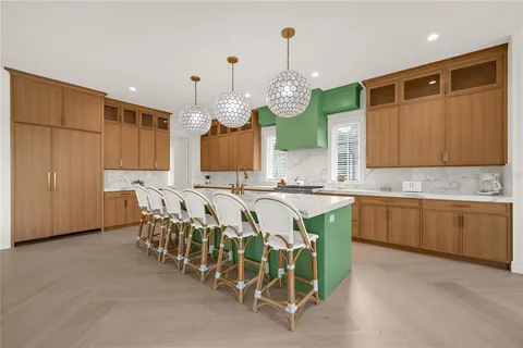 a bedroom with a bed a table and a window