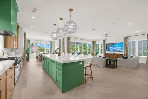 a bathroom with a granite countertop toilet a sink and a mirror