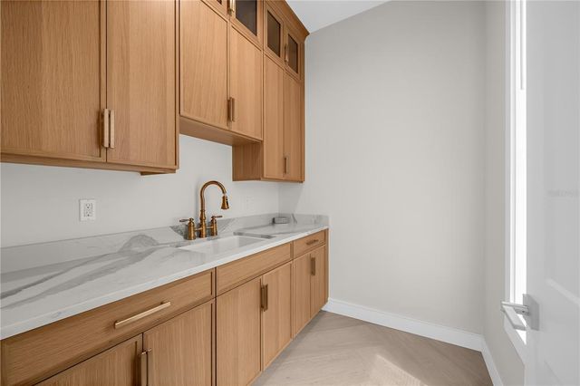 a bedroom with a bed and a mirror