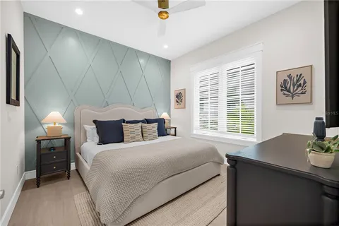a bathroom with a sink a mirror and a bathtub