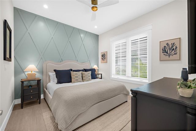 a bathroom with a sink a mirror and a bathtub