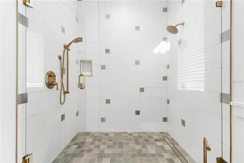 a view of a patio with table and chairs and potted plants