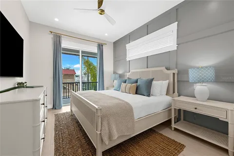 a view of a house with a yard and a patio