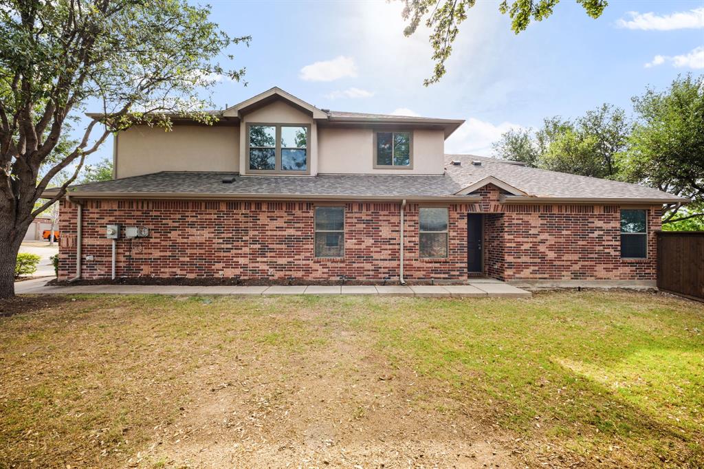 1013 Lucy Lane Allen, TX 75013 - Photo 3 of 30 a front view of a house with a yard and garage