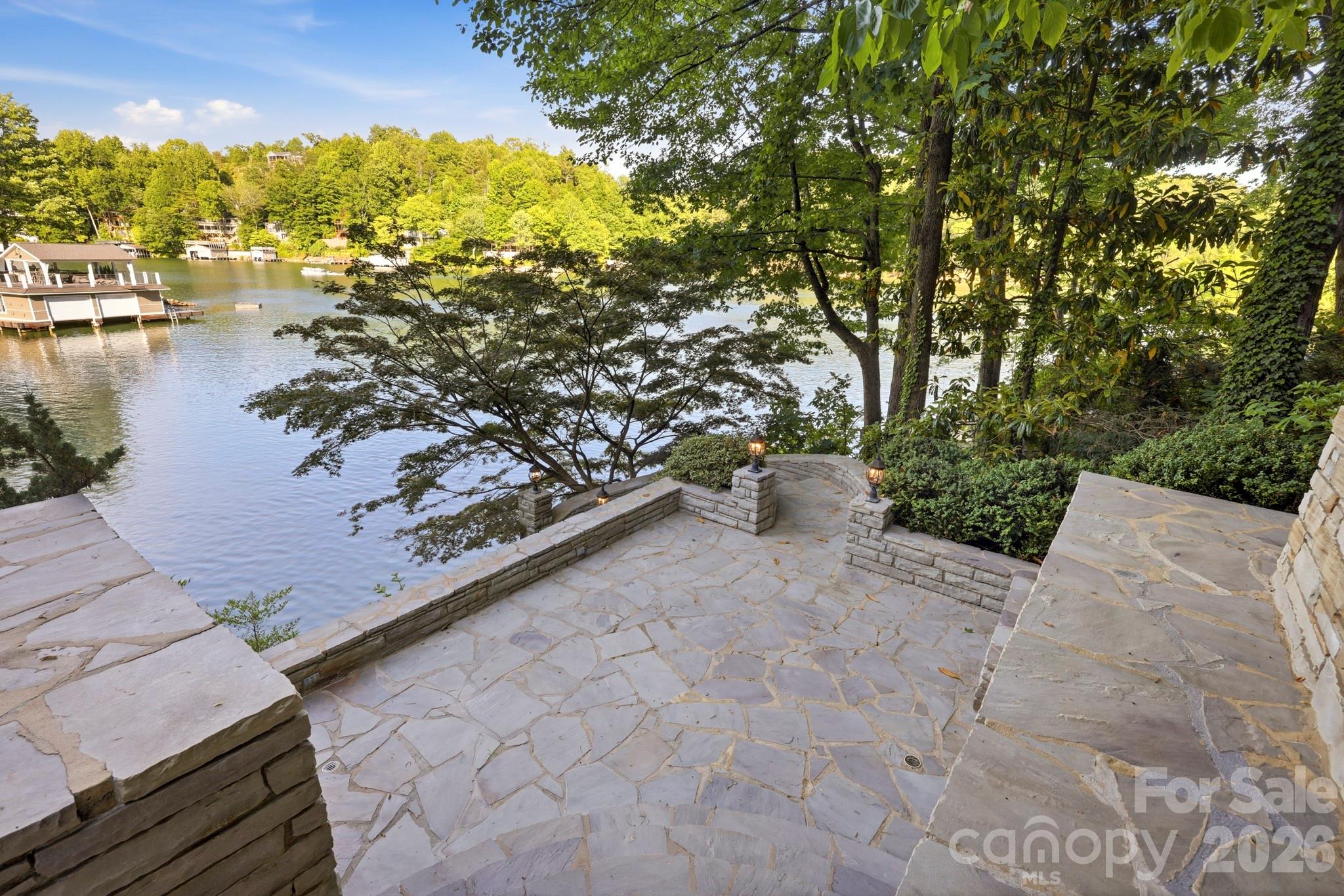 151 Garner Road Lake Lure, NC 28746 - Photo 36 of 48 a view of a yard with an outdoor seating