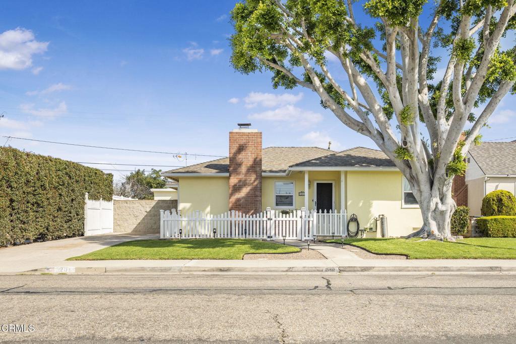 1201 West Beverly Drive Oxnard, CA 93030 - Photo 1 of 1 a front view of a house with a yard