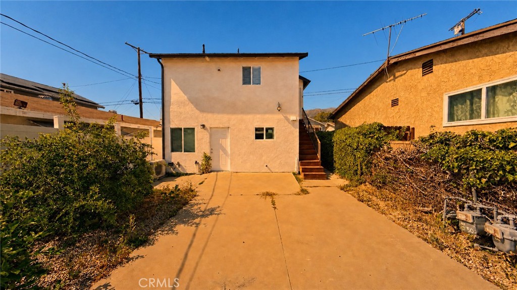 6851 Foothill Boulevard Tujunga, CA 91042 - Photo 47 of 50 a view of a house with a street