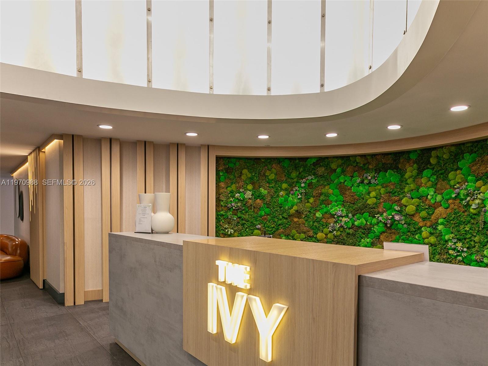 90 Southwest 3rd Street, Unit 1611 Miami, FL 33130 - Photo 2 of 44 a view of kitchen with stainless steel appliances a refrigerator and a counter top