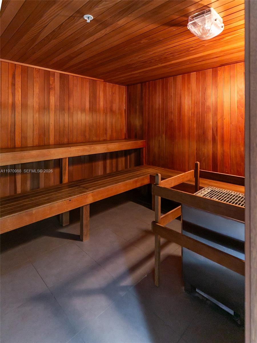 90 Southwest 3rd Street, Unit 1611 Miami, FL 33130 - Photo 30 of 44 a reading room with wooden furniture