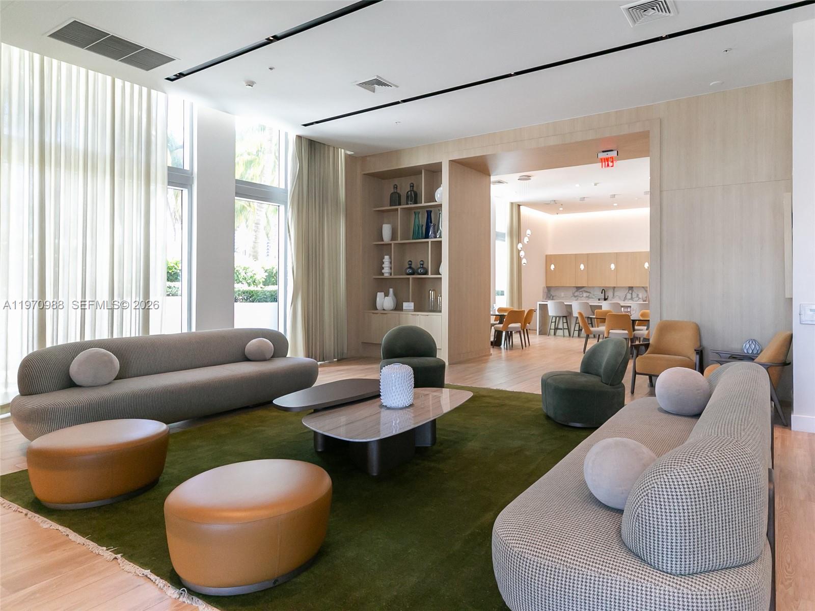 90 Southwest 3rd Street, Unit 1611 Miami, FL 33130 - Photo 37 of 44 a living room with furniture and a large window