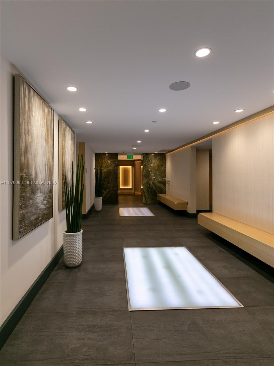 90 Southwest 3rd Street, Unit 1611 Miami, FL 33130 - Photo 4 of 44 a view of a big room with lots of potted plants