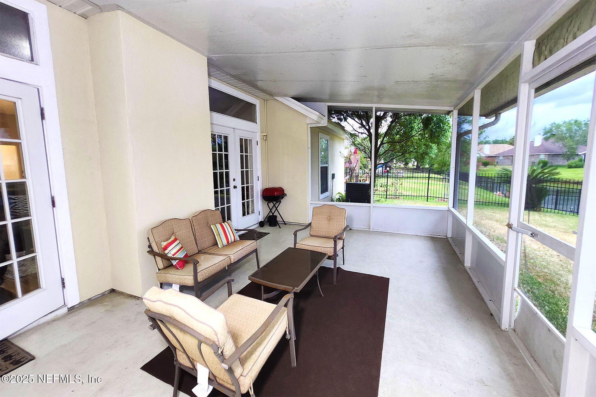 6257 Duclay Road Jacksonville, FL 32244 - Photo 19 of 21 a living room with furniture and a large window