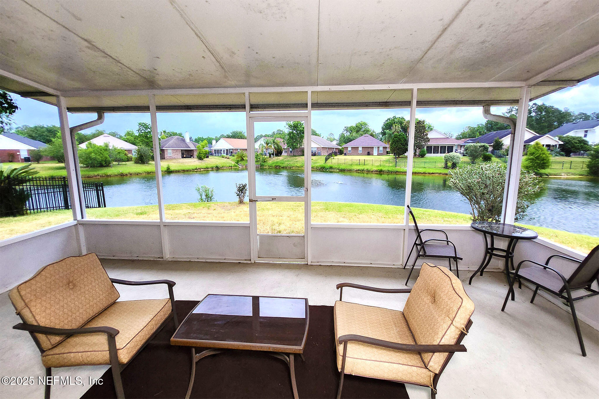 6257 Duclay Road Jacksonville, FL 32244 - Photo 20 of 21 a view of a dining room with furniture water view and a yard