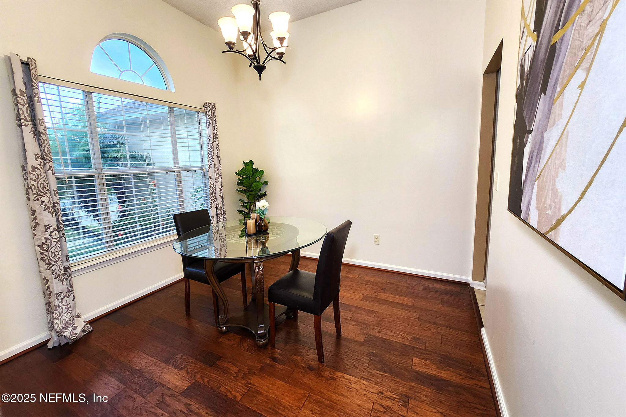 6257 Duclay Road Jacksonville, FL 32244 - Photo 3 of 21 a view of a dining room with furniture window and wooden floor