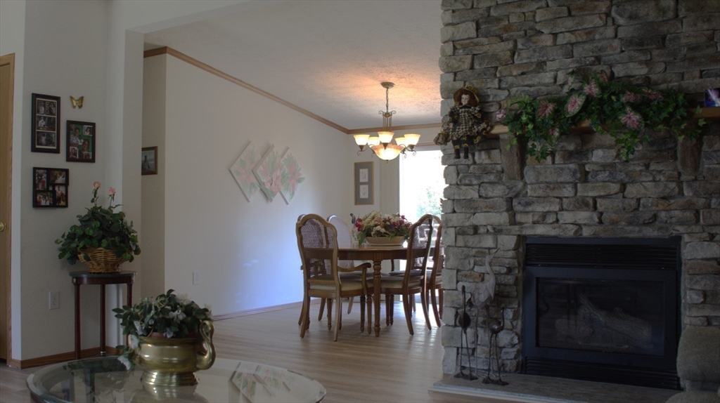 20 Deer Run Brookfield, MA 01506 - Photo 13 of 29 a dining room with furniture and wooden floor