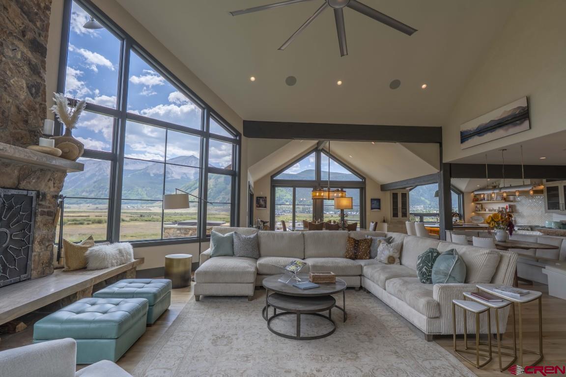 7 Moon Ridge Lane Crested Butte, CO 81224 - Photo 20 of 44 a living room with furniture and a fireplace