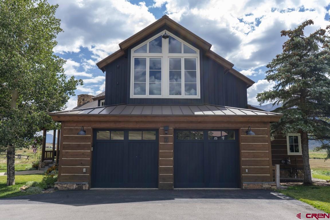 7 Moon Ridge Lane Crested Butte, CO 81224 - Photo 3 of 44 a front view of a house