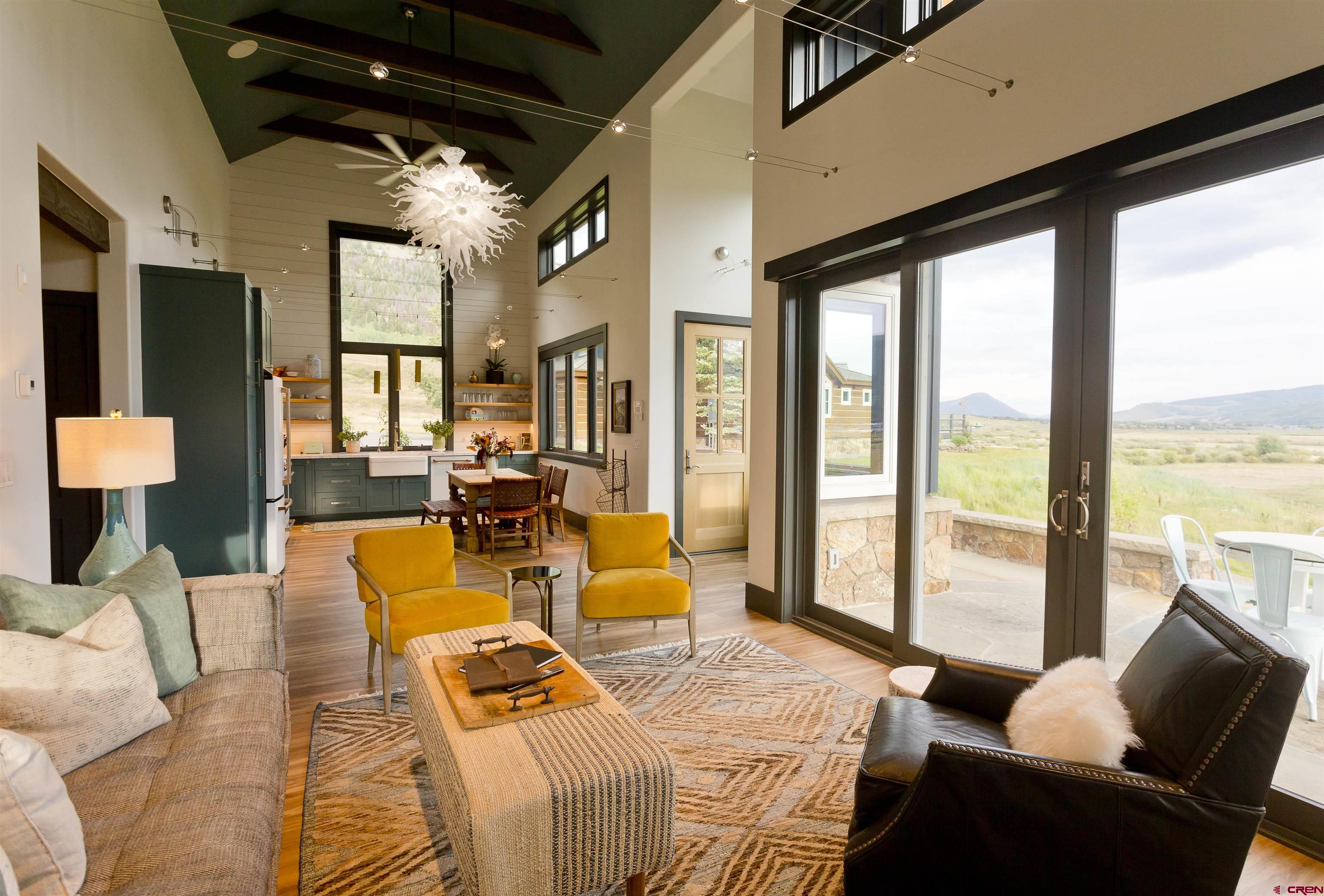 7 Moon Ridge Lane Crested Butte, CO 81224 - Photo 35 of 44 a living room with furniture and a large window