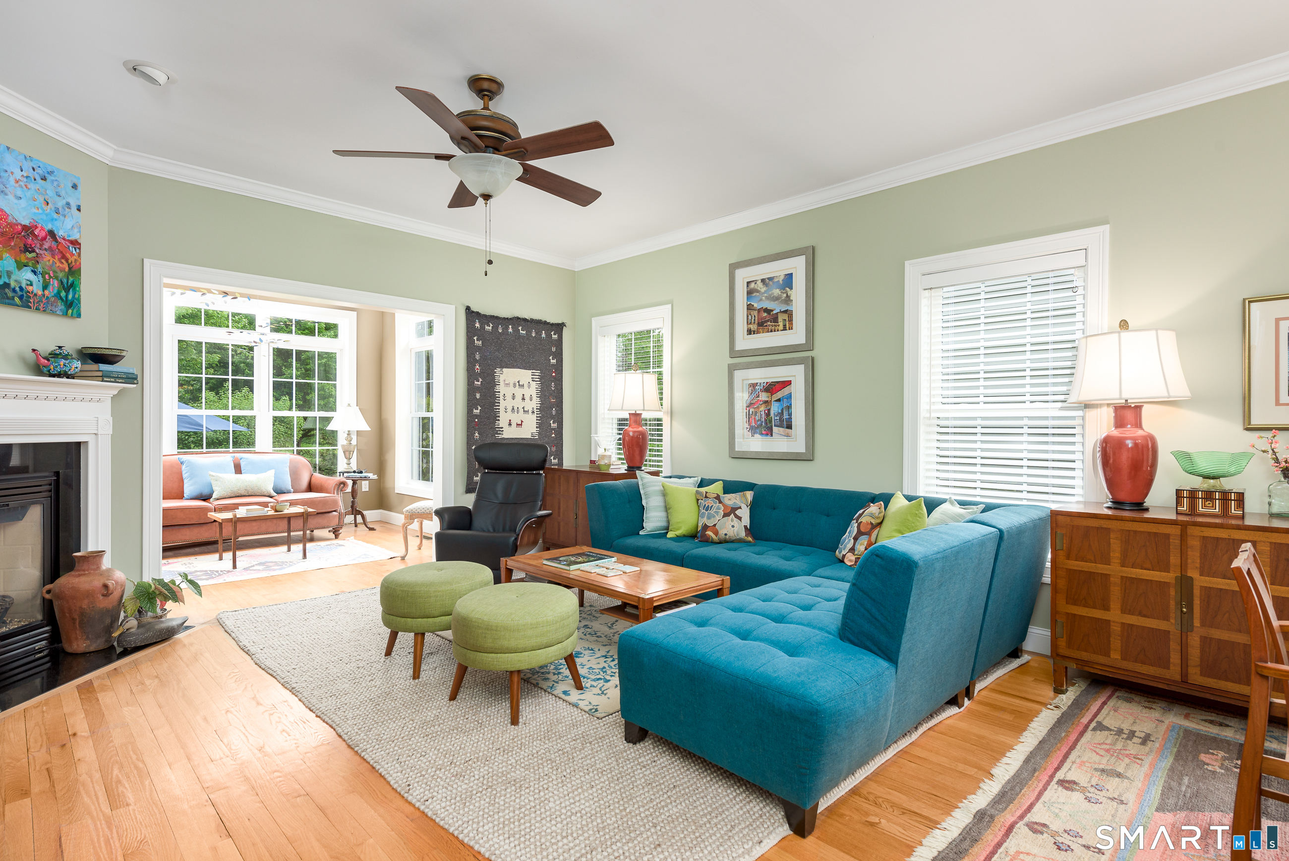 8 Greendale Drive, Unit 8 Suffield, CT 06078 - Photo 7 of 40 a living room with furniture and a large window