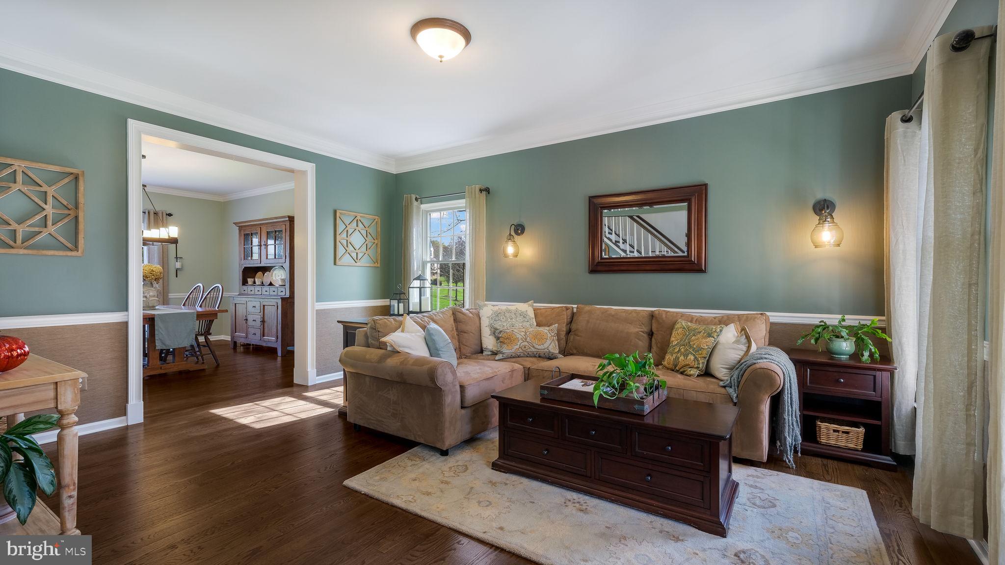 84 Brinker Drive Doylestown, PA 18901 - Photo 13 of 52 Living Room with Chair Rail and Crown Molding