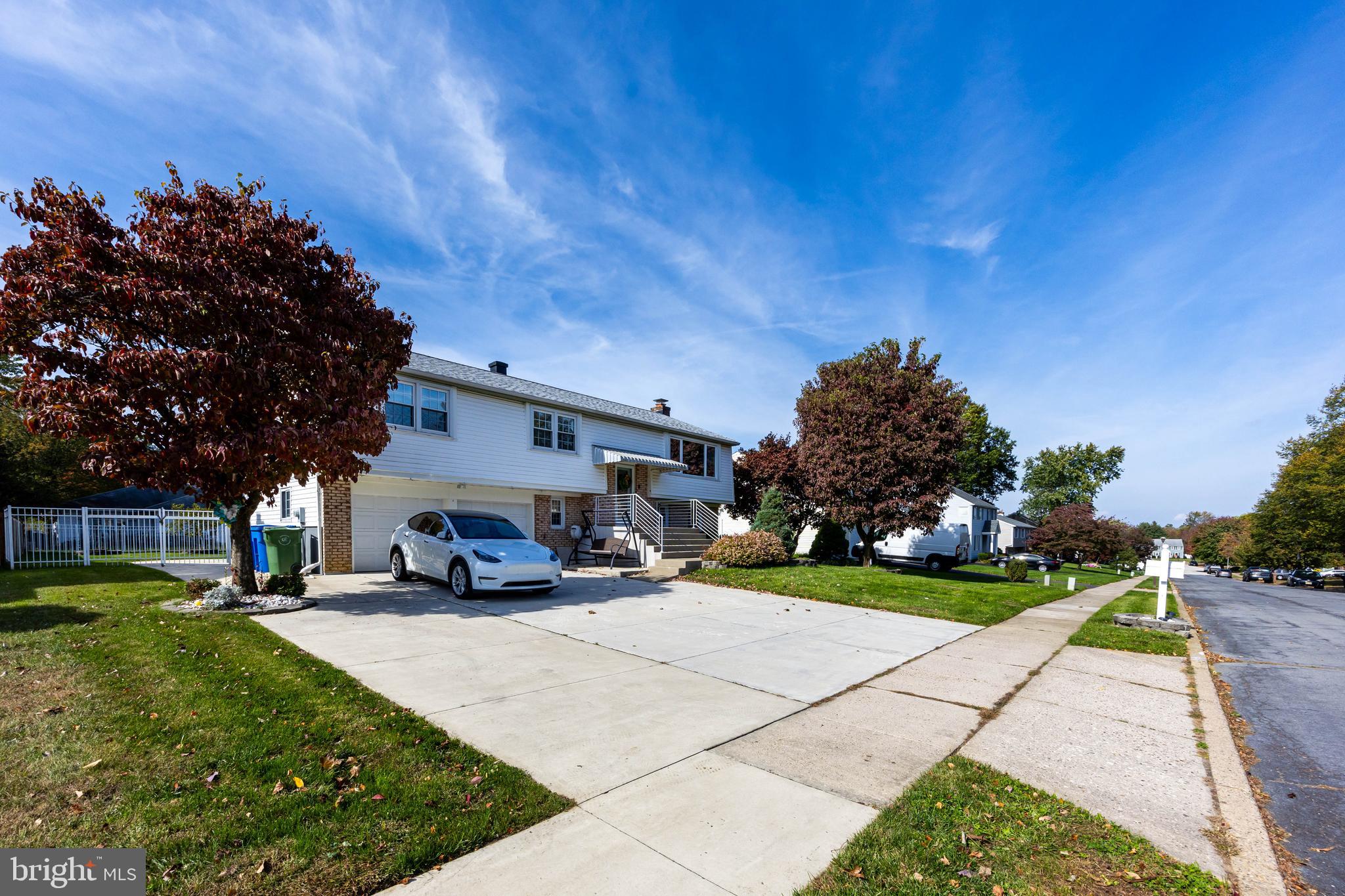 a car parked in front of a brick building
