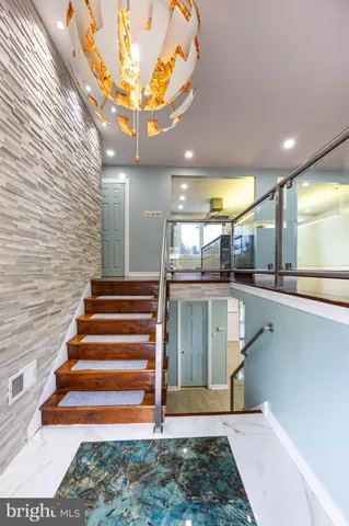 a view of entryway with a front door