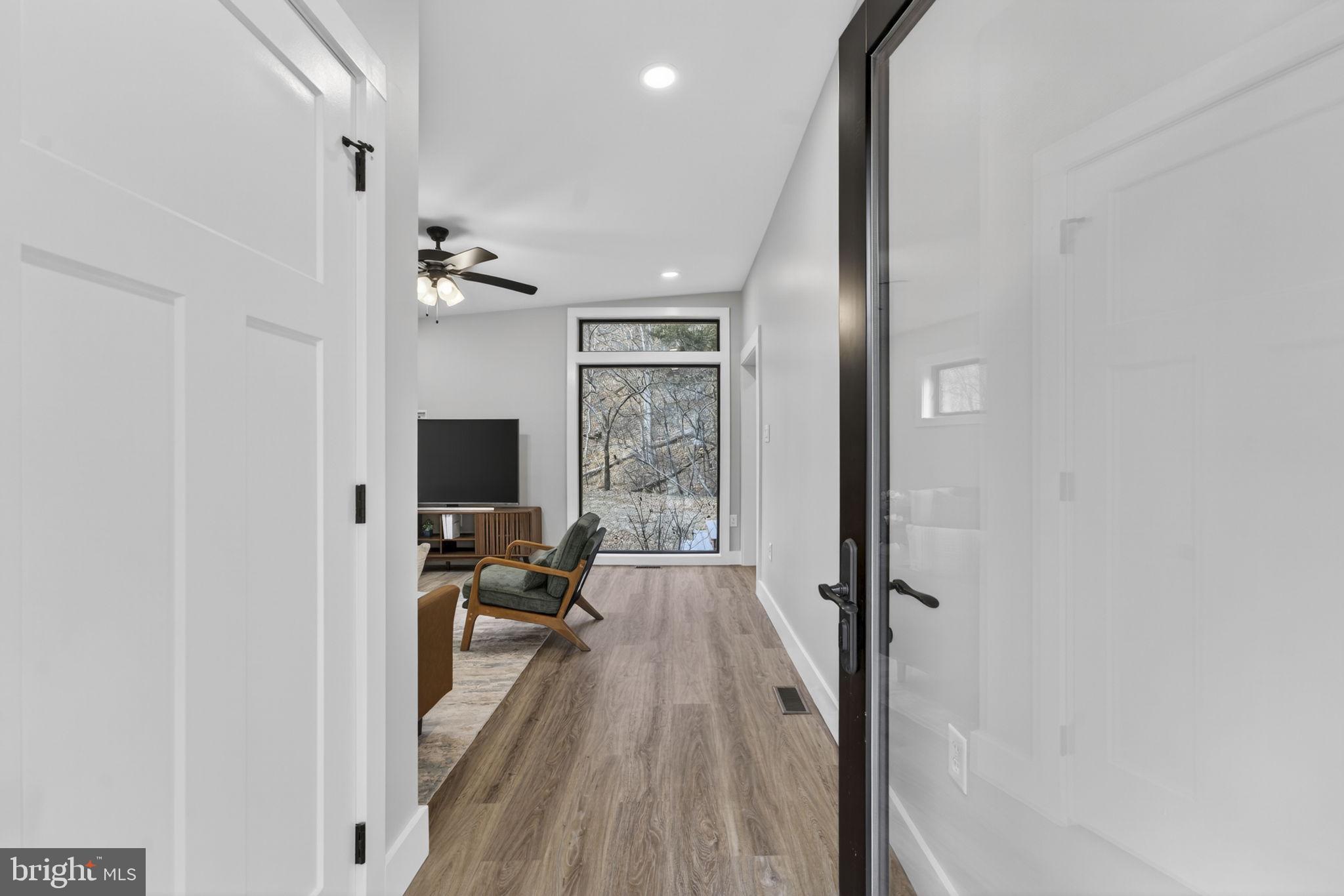 1956 Dove Hollow Road Mathias, WV 26812 - Photo 11 of 113 Entry to living room and coat closet