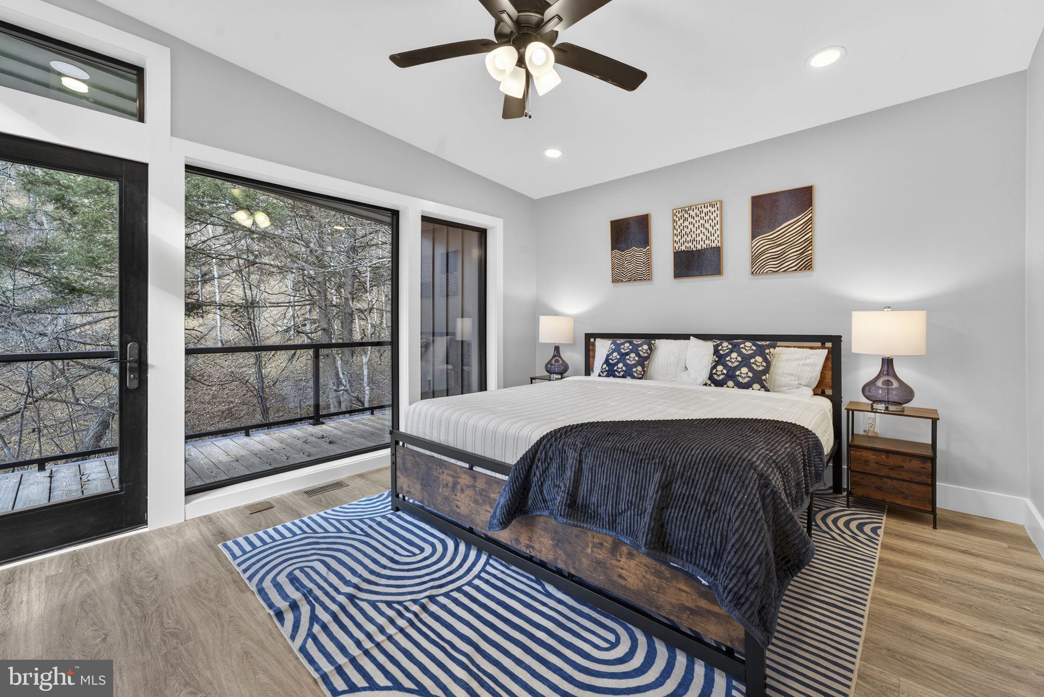 1956 Dove Hollow Road Mathias, WV 26812 - Photo 3 of 113 Primary bedroom with private deck