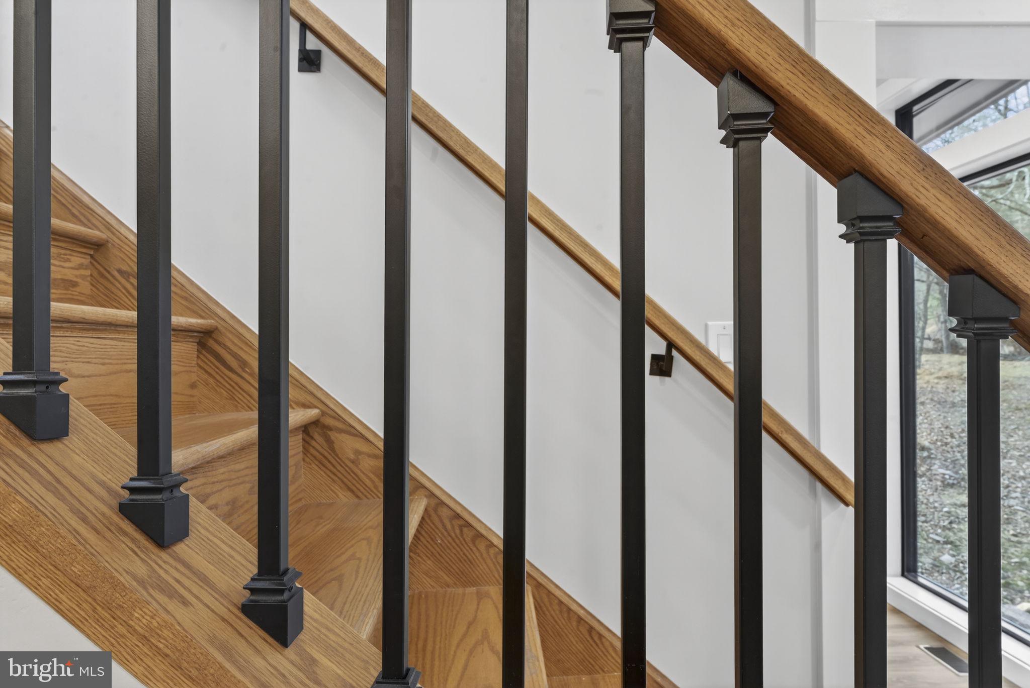 1956 Dove Hollow Road Mathias, WV 26812 - Photo 32 of 113 Wood and Iron stairs to upper level