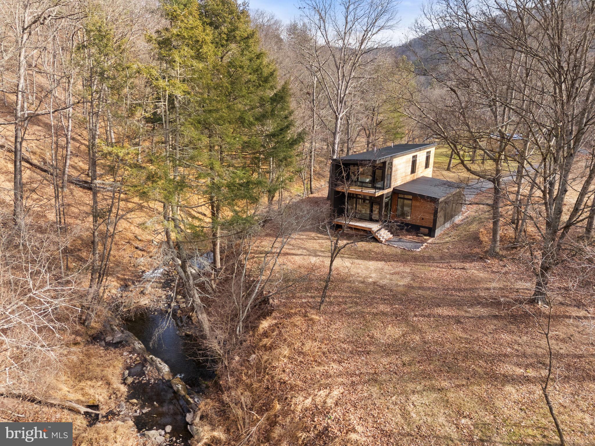 1956 Dove Hollow Road Mathias, WV 26812 - Photo 96 of 113 Aerial View of House and Stream