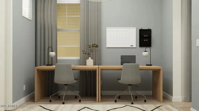 a view of a workspace with furniture